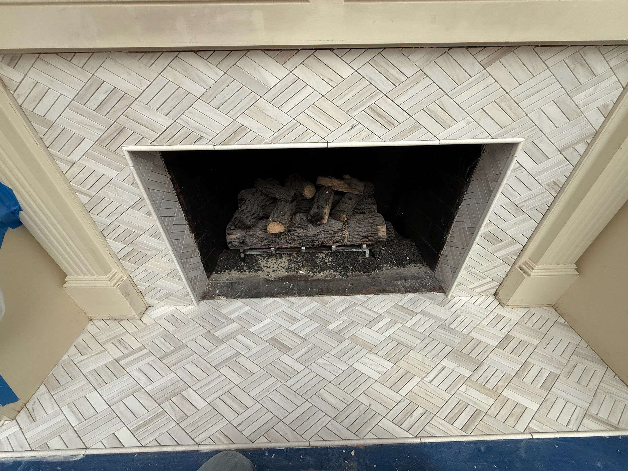 After: Fireplace Tile Remodel — Red Mosaic Surround in Thornblade