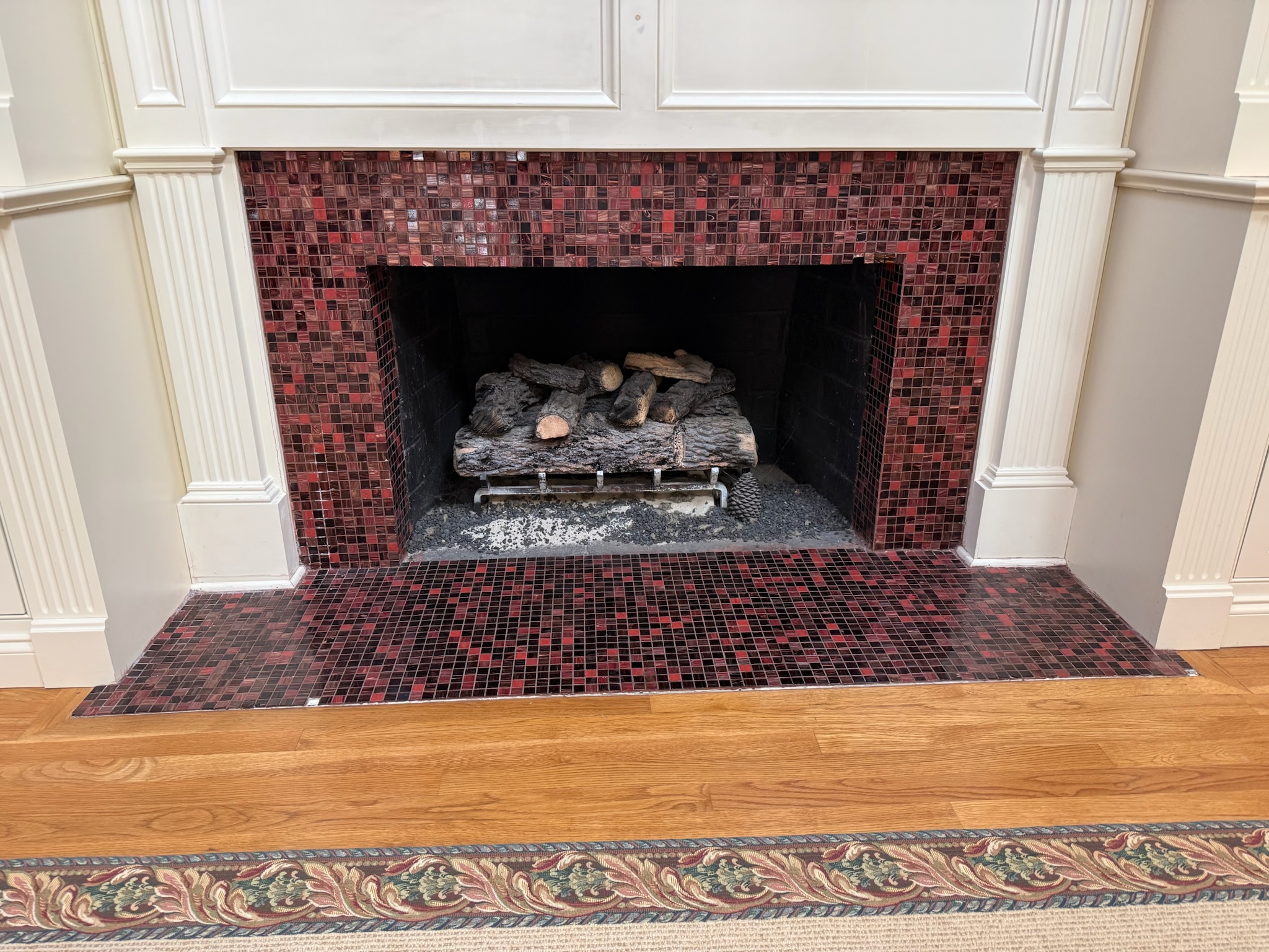 Before: Fireplace Tile Remodel — Red Mosaic Surround in Thornblade